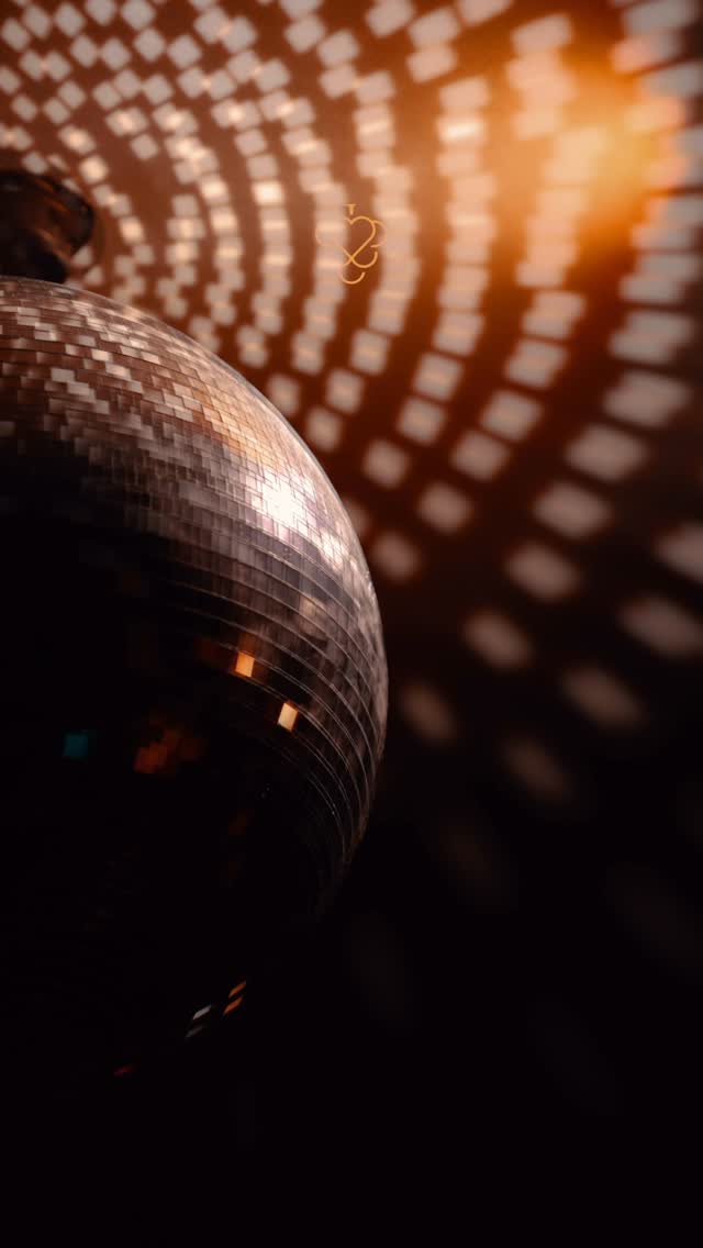 Disco ball with amber light and GRAPE logo