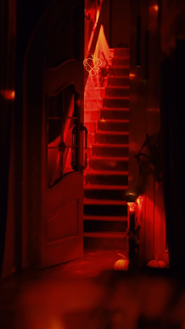 The red-lit entrance staircase of GRAPE